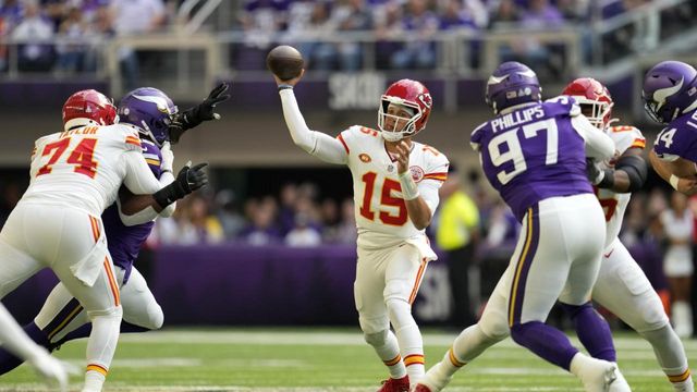 Kansas City Chiefs quarterback Patrick Mahomes (15) was grabbed by