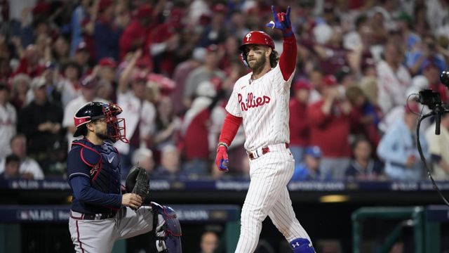 Angels use 3 solo homers to cool off MLB-leading Braves with 4-1