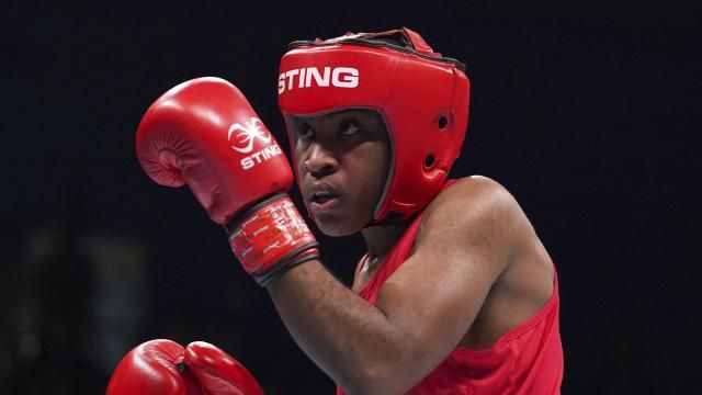 Boxer Cindy Ngamba of Cameroon trains in Sheffield, England, on Jan. 18, 2024. Cindy Ngamba is one of the members of the Refugee Team for the Paris Olympics which will feature 36 athletes from 11 countries in 12 sports. They were picked from more than 70 scholarships, International Olympic Committee president Thomas Bach said at the team announcement on Thursday, May 2, 2024. (Martin Rickett/PA via AP)