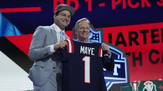 North Carolina quarterback Drake Maye poses with NFL commissioner Roger Goodell after being chosen by the New England Patriots with the third overall pick during the first round of the NFL football draft, Thursday, April 25, 2024, in Detroit. (AP Photo/Jeff Roberson)