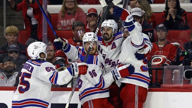 New York Rangers' Chris Kreider, second from right, celebrates his goal against the Carolina Hurricanes with teammates during the third period in Game 6 of an NHL hockey Stanley Cup second-round playoff series in Raleigh, N.C., Thursday, May 16, 2024. (AP Photo/Karl B DeBlaker)